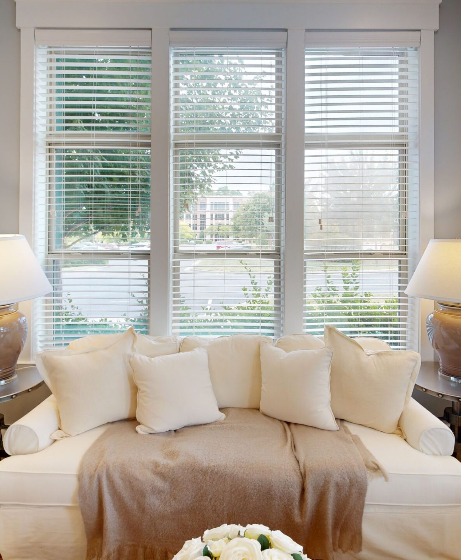 Apartments at Palladian Place kitchen with bar and bar stools, nice natural light, and abundance cabinet storage